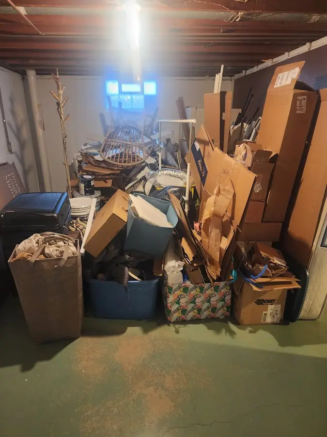 Roll-off dumpster container at job site for 6 Yard Dumpster Rental in Kawkawlin